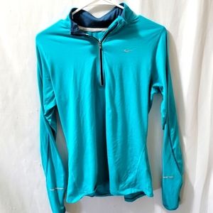 Nike Dri-Fit 1/4 zip women's top in EUC.  Size medium.